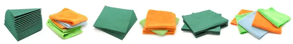 从不同角度将纸和织物餐巾纸放在白色背景上隔离 免版税图库图片