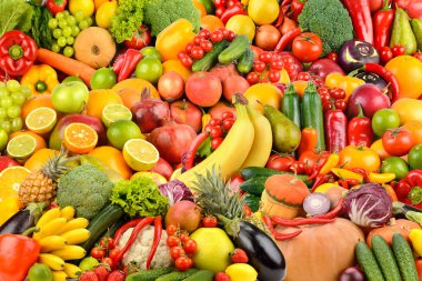 Çeşitli olgun meyveler, meyveler ve sebzeler. Yemek konsepti geçmişi. Üst görünüm.