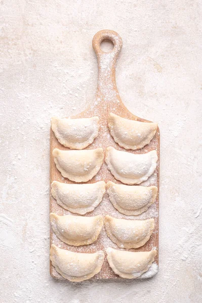Raw Dumpling Potatoes Preparation Dumplings Light Background Wooden Board Fresh — Zdjęcie stockowe
