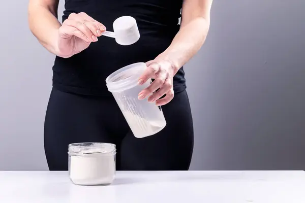 Woman Makes Collagen Mixture Mixing Glass Sports Nutrition Drink Protein Royalty Free Stock Photos