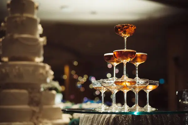 small tower of champagne\'s glass in wedding reception party
