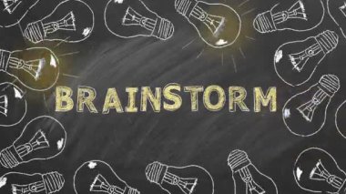 Blinking light bulbs with lettering BRAINSTORM hand drawn in chalk on blackboard. Concept of brainstorming. Idea concept.