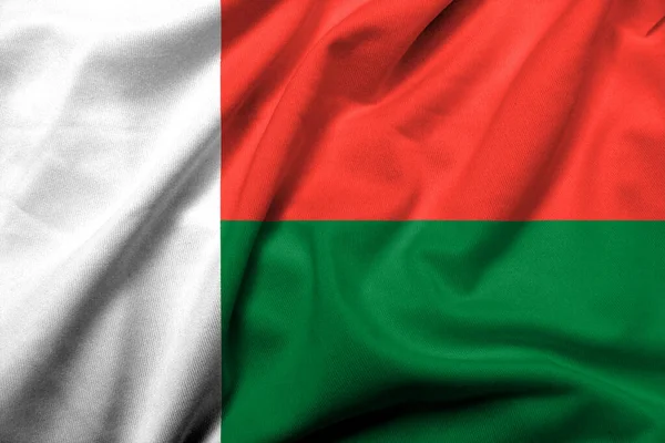 Realistic Flag Madagascar Satin Fabric Texture Stockbild