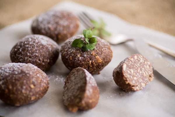 chocolate sweet cakes made from pureed cookies with additives, on baking paper.