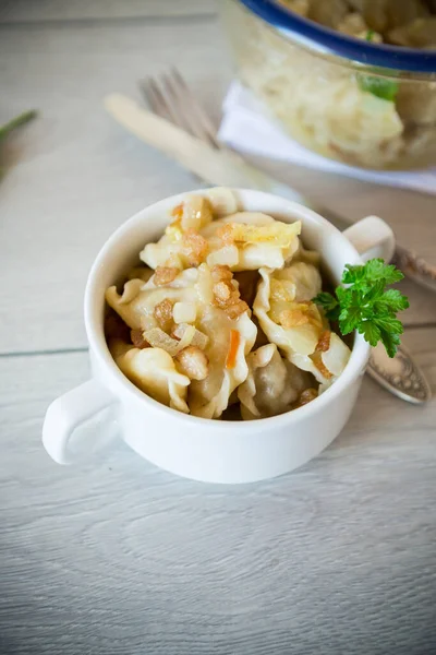 Cooked Dumplings Potatoes Fried Onions Bowl Wooden Table — 스톡 사진