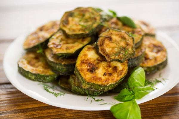 Zucchini Fried Circles Spices Herbs Plate Wooden Table — Stock Photo, Image