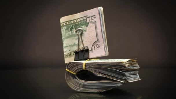 Stack Dollar Bills Collected Elastic Band Stationery Clip Isolated Black — Stock Video