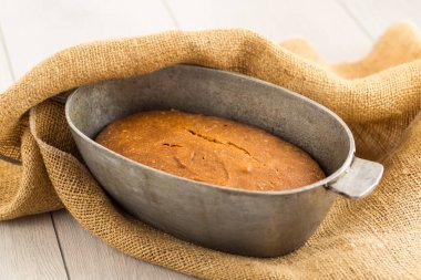 Fresh Bread on a Wooden Board. clipart