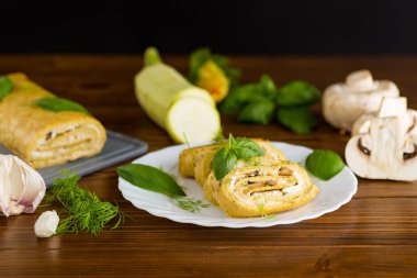 Masada peynir ve mantarlı kabak rulosu..