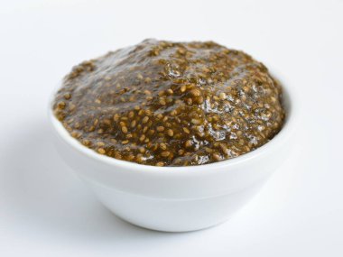 Chia seeds caviar with laminaria on white background.