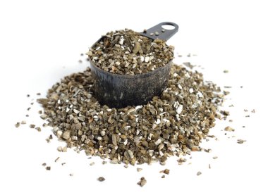 Heep Expanded Vermiculite isolated on white background.