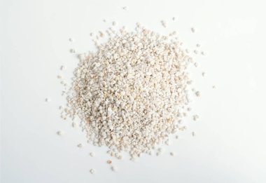 Heep of Expanded perlite on white background.