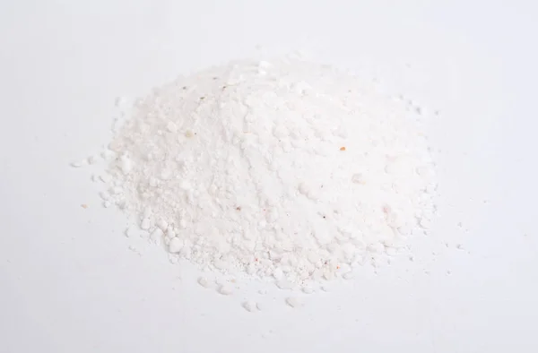 Dolomite mineral powder heep on white background