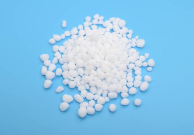 Urea, also called carbamide on white background. clipart