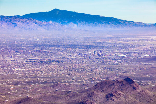 Dry desert valley with sprawling city of Tucson in southern Arizona, United States of America, USA