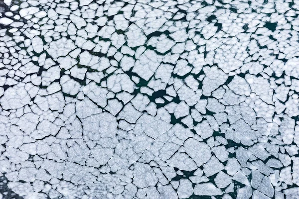 冬季冰冻海面浮冰碎裂成冰的背景纹理模式抽象 — 图库照片