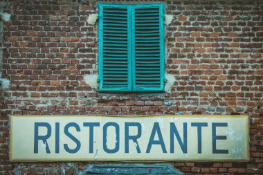 Old vintage restaurant sign in Italy - Concept of retro, traditional Ristorante design