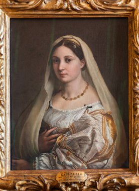 Floransa, İtalya - 23 Eylül 2023: Pitti Sarayı antik resim müzesi. Raffaello Sanzio 'dan La Velata, 1514..