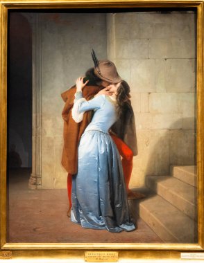 Milan, Italy - 23 September 2023: Brera antique painting museum. The Kiss - Il Bacio - by Francesco Hayez, 1859 clipart