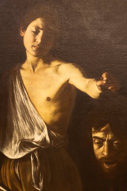 Roma, İtalya - 28 Aralık 2023: Davut Goliath 'ın lideri, Caravaggio, 1610 - Tuval üzerine yağ - cm 125 x 101, Galleria Borghese