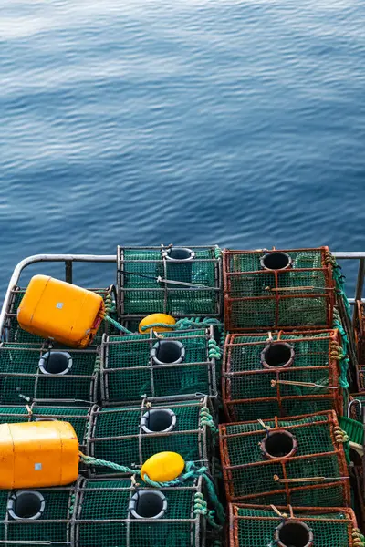 stock image Close-up of weathered fish traps and buoys in a fishing port in Galicia, Spain.