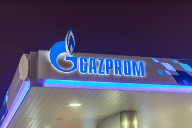 Belgrade, Serbia - November 27, 2022: Detail of the Gazprom Neft Gas station tothem logo in Belgrade, Serbia. Logo. Gazprom is one of the main power and energy companies of Russi