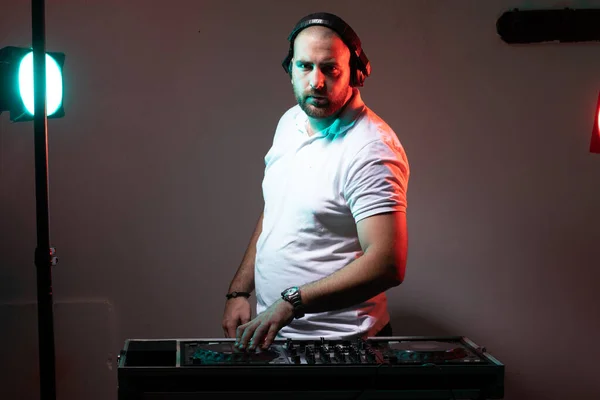 DJ With Headphones For Popular Music Event Party stock photo