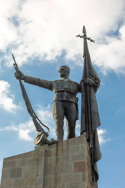 stock image Kraljevo, Serbia - February 18, 2022: Monument to the Milutin, Serbian warriors who died for freedom in the wars of 1912-1918, Soldier, on the main square of Kralevo, Trg Srpskih Ratnika,