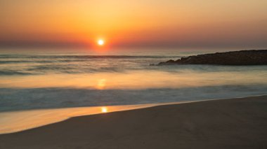 Furadouro Beach, Portekiz günbatımı manzara.