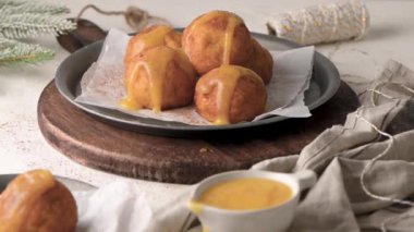 Rabanada 's poveiras with egg cream and tarnamon on on a kitchen counter during the Christmas season.