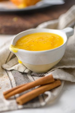 Rabanada 's poveiras with egg cream and tarnamon on on a kitchen counter during the Christmas season.