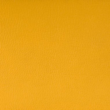 Sarı yapay deri doku arkaplanı.
