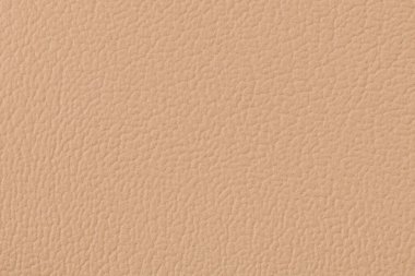 Bej rengi yapay deri dokusu arkaplanı.