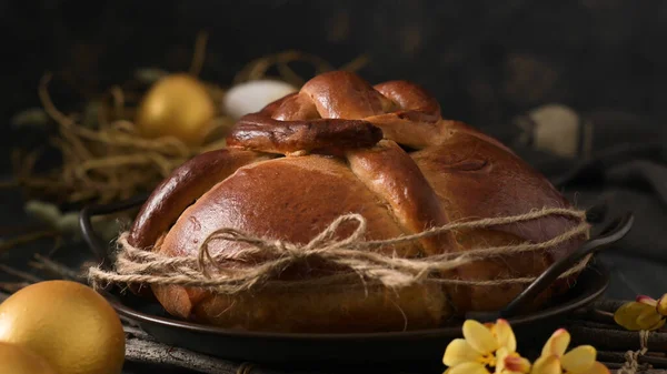 stock image Easter folar with egg on wooden table top.