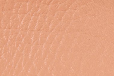 Detaylı kahverengi deri doku arkaplanının yakınlaştırılması.