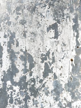 Metal desenli beyaz boya soyuldu, arka plan olarak kullanılabilir..