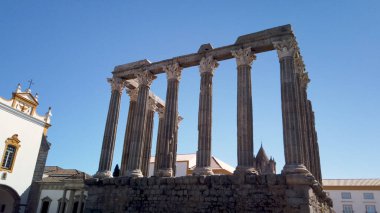 Architectural detail of the Roman temple of Evora in Portugal or Temple of Diana. It is a UNESCO World Heritage Site. clipart