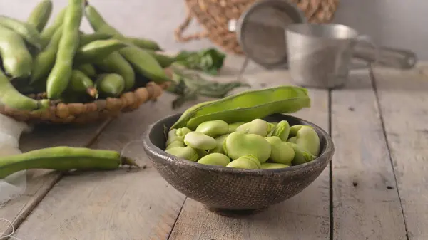 Fresh Raw Green Broad Beans Wooden Table Stockfoto