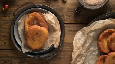 Traditional Portuguese Christmas Rabanadas. Spanish Torrijas on kitchen countertop. clipart