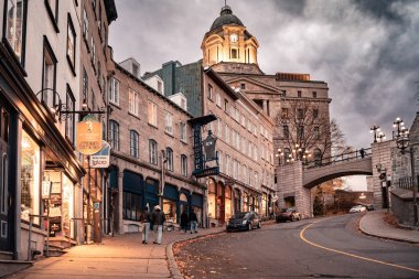Quebec City, Canada - November 7, 2022:  View of historic lower Quebec City in Canada seen at night with people and lights