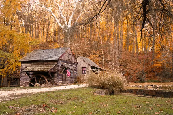 stock image Cuttalossa barn mill in Bucks County Pennsylvania with colorful fall foliage.