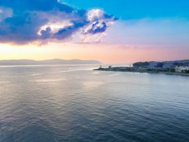 Aerial sunset view of Hudson River in New York State near Tarrytown with Sleepy Hollow Lighthouse in view  clipart