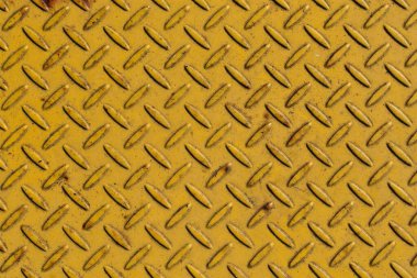 Soyut arka plan tasarımı için sarı çelik güvenlik levhası; sert sanayi ve erkekliğin sembolü.
