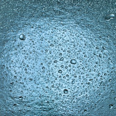 Turkuaz 'a su damlaları soyut arkaplan olarak yakından çekildi.