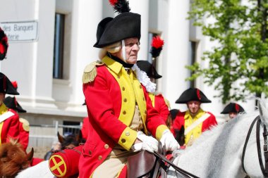 GENEVA; SWITZERLAND-May 04, 2024: Bernese Dragoons Cavalry officer - street parade participant. Old Grenadiers March, 275-years anniversary of the Vieux Grenadiers society, May 04, 2024 clipart