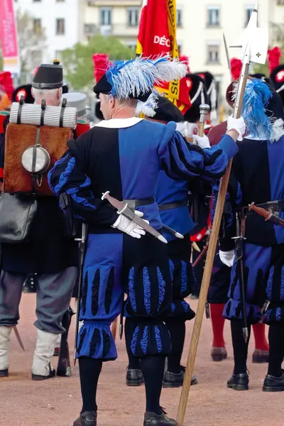 stock image GENEVA; SWITZERLAND-May 04, 2024: Participants of the Old Grenadiers March in medieval costumes, 275-years anniversary of the Vieux Grenadiers society, May 04, 2024