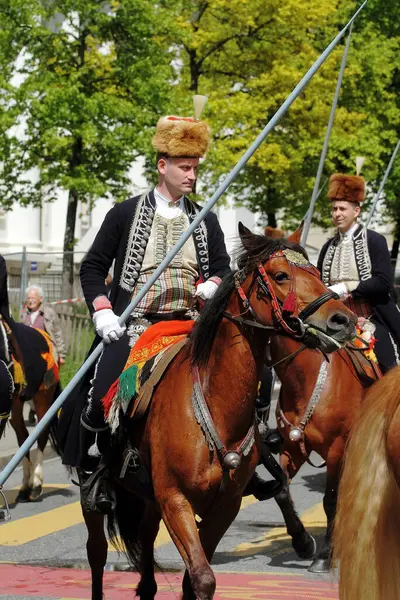 stock image GENEVA; SWITZERLAND-May 04, 2024: Sinjska Alka Croatia Cavalry spearmans - street parade participants. Old Grenadiers March, 275-years anniversary of the Vieux Grenadiers society, May 04, 2024