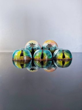 Handmade chocolate bonbons in colorful glaze with assorted fillings  unwrapped artisan sweets