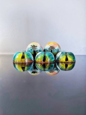 Handmade chocolate bonbons in colorful glaze with assorted fillings  unwrapped artisan sweets