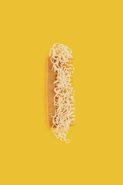 Concept Curly Hair Noodles Comb Bright Yellow Background — Stock Photo, Image